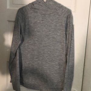 a gray sweater